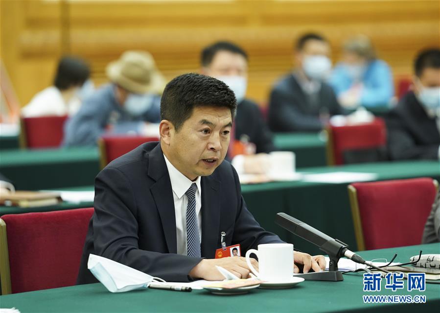 (新华全媒头条·图文互动)(5)从人民中汲取磅礴力量——习近平总书记同出席2020年全国两会人大代表、政协委员共商国是纪实